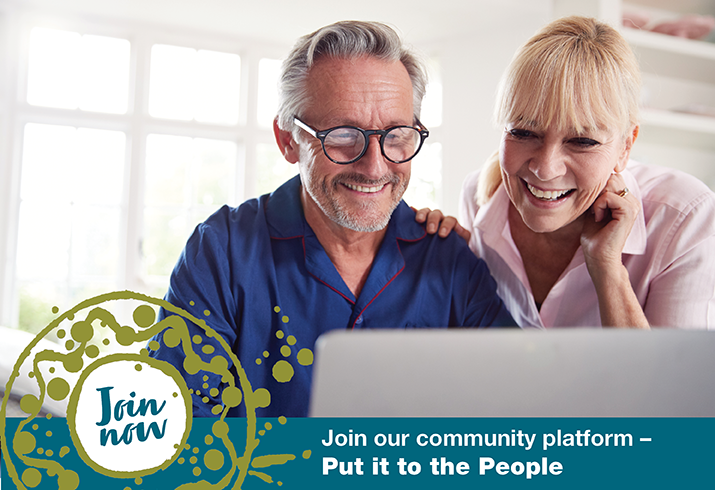 A middle aged man and woman review something on a laptop computer screen. Text on the image reads 'Join now - Join our community platform Put it to the People'